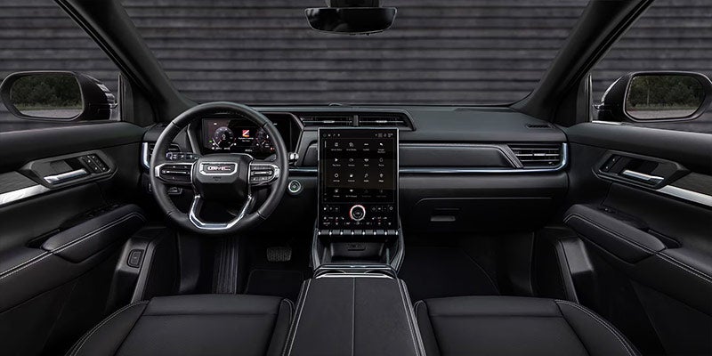 Full view of 2025 GMC Terrain dashboard with steering wheel, center console and 8-inch touchscreen